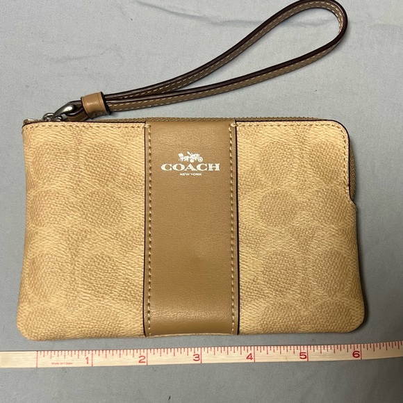 Coach Handbags - Coach Beige and Brown Wristlet